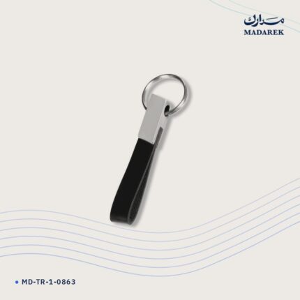 ميدالية مفاتيح — معدن · جلد